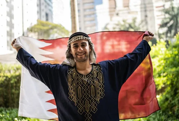 portrait of a young man with qatari flag